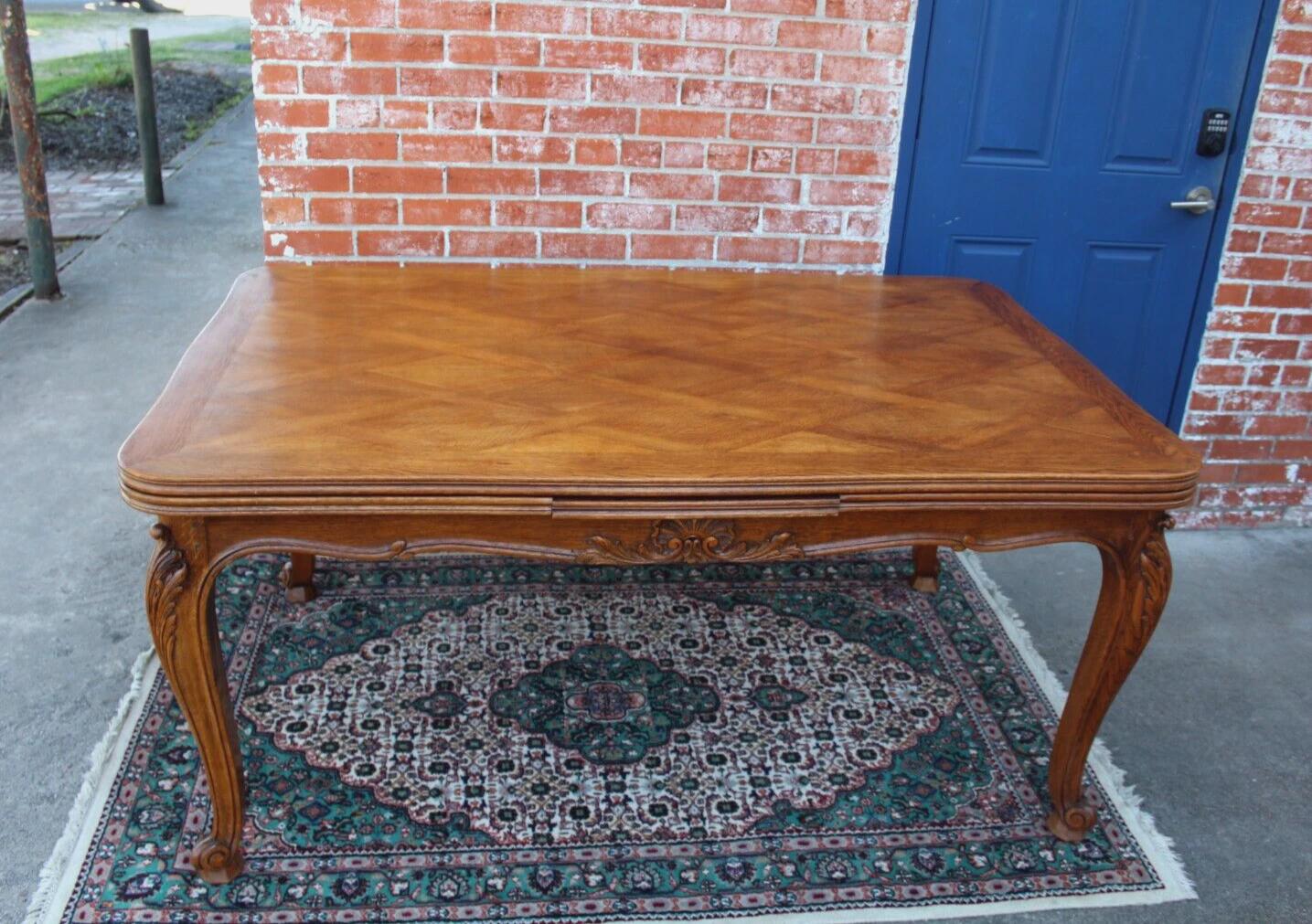 French Antique Louis XV Oak Dining Table | Carved Floral Apron & Parquet Top