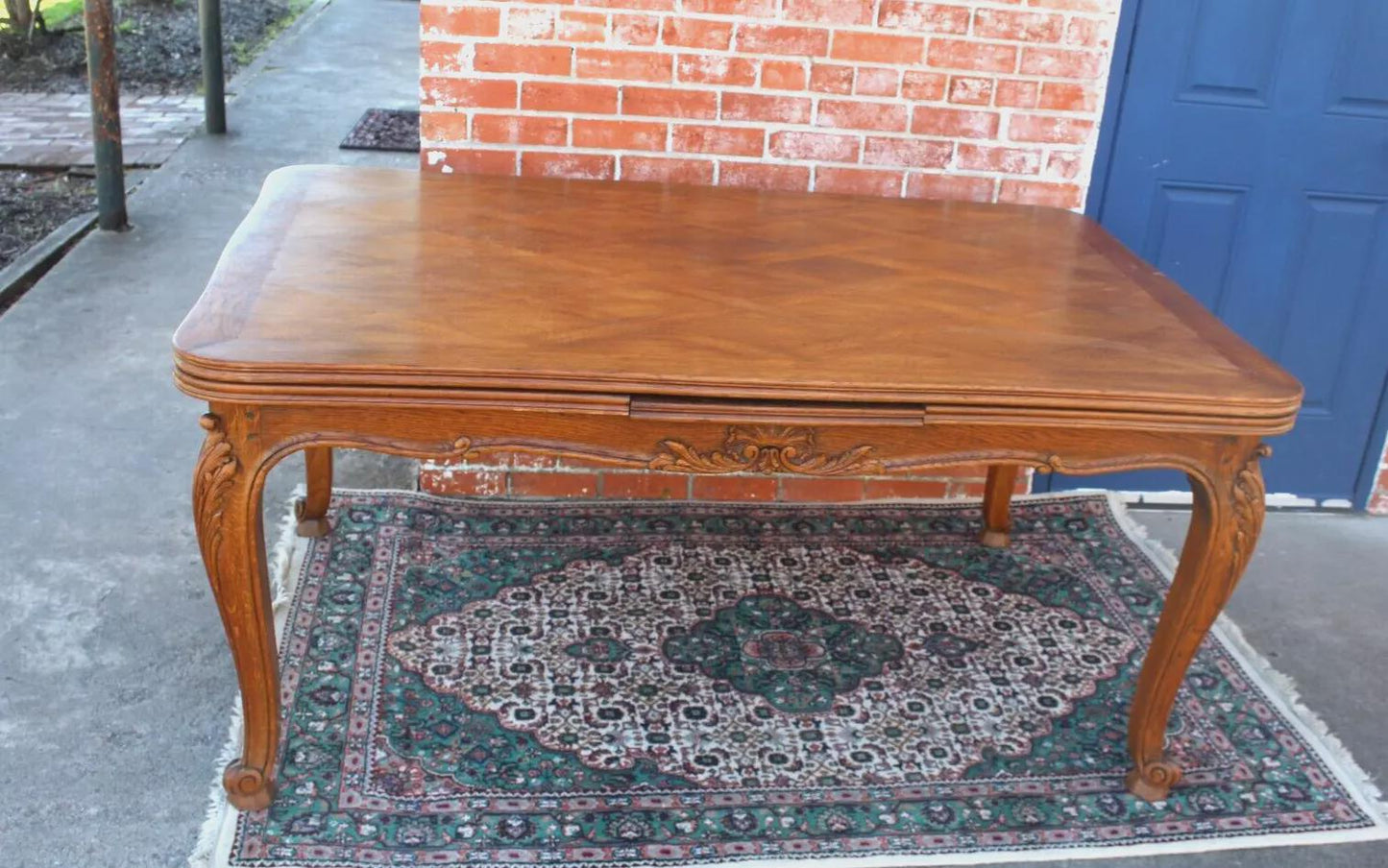 French Antique Louis XV Oak Dining Table | Carved Floral Apron & Parquet Top