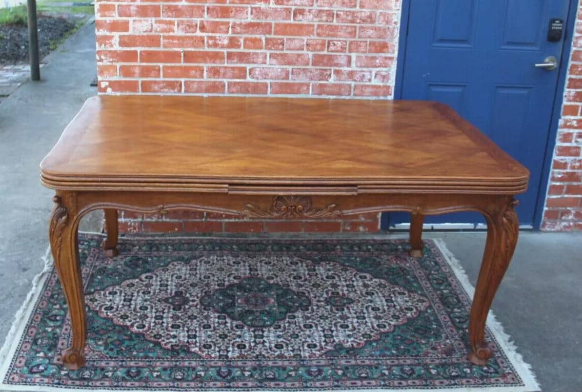 French Antique Louis XV Oak Dining Table | Carved Floral Apron & Parquet Top
