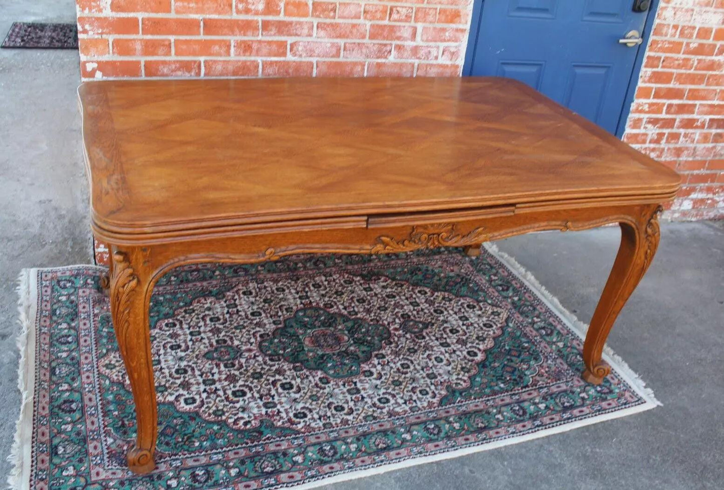 French Antique Louis XV Oak Dining Table | Carved Floral Apron & Parquet Top