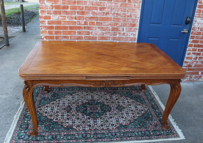 French Antique Louis XV Oak Dining Table | Carved Floral Apron & Parquet Top