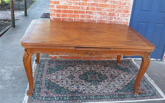 French Antique Louis XV Oak Dining Table | Carved Floral Apron & Parquet Top
