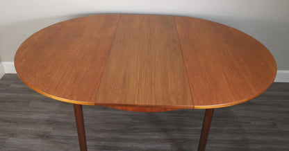 Mid Century Round Teak Butterfly Leaf Dining Table / Oval Table
