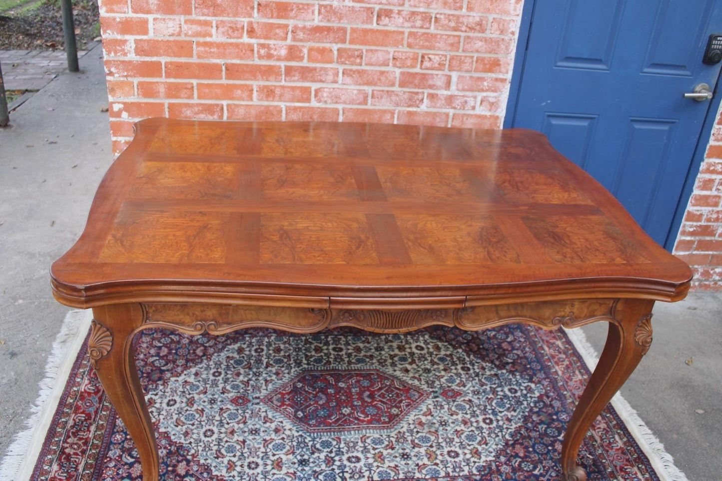 French Antique Louis XV Burled Walnut Dining Table | Carved Floral Apron